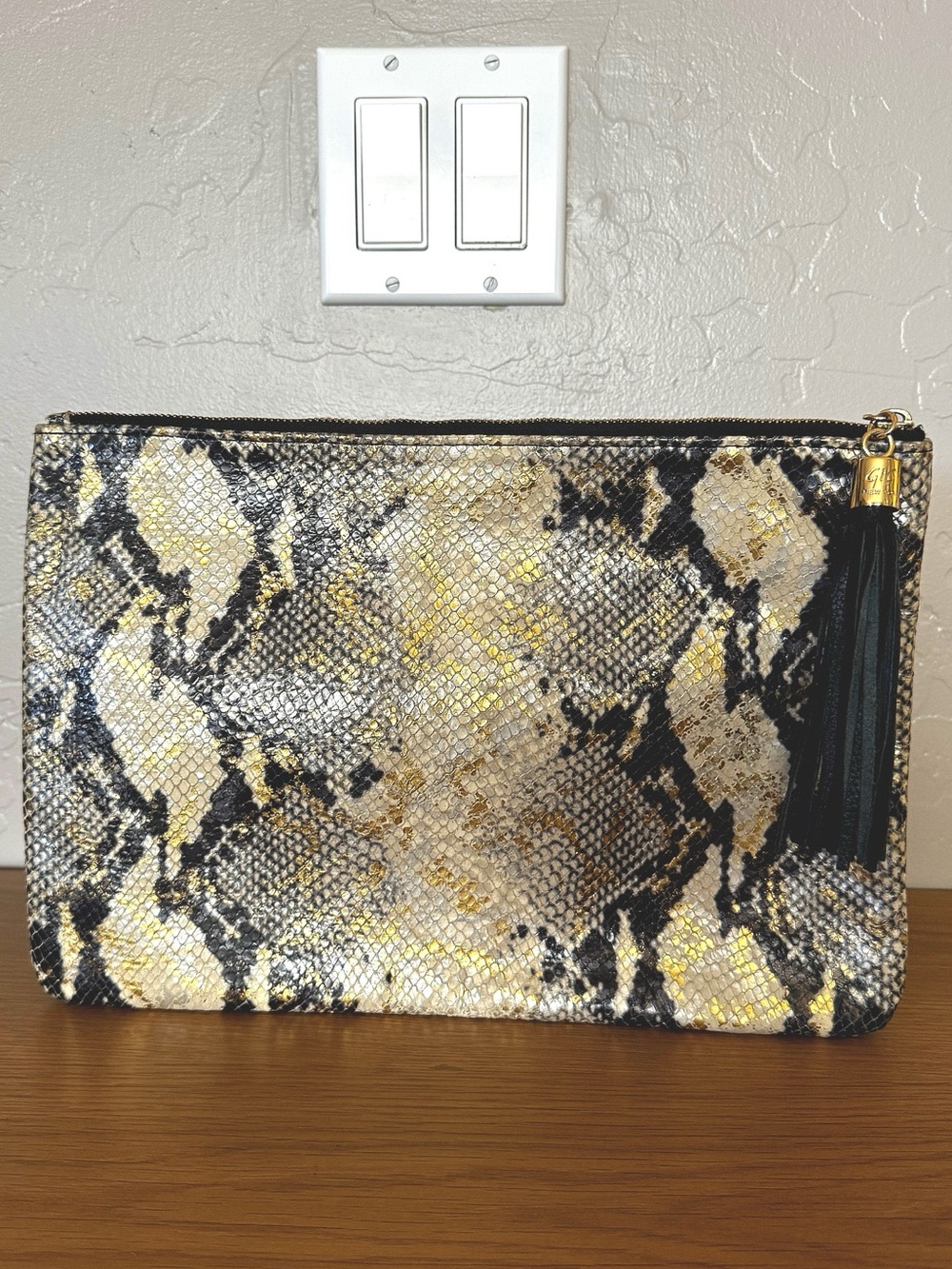Gigi New York metallic snake Uber clutch